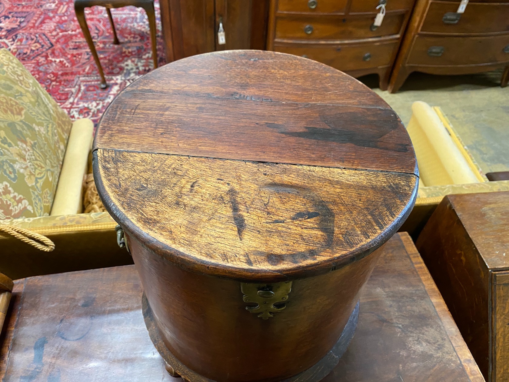 A George III style circular mahogany work box, diameter 38cm, height 47cm